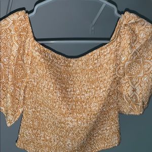 Tube top with flows arm